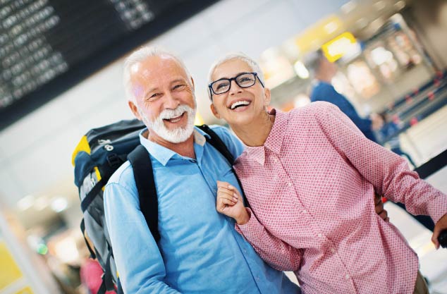 mature-couple-getting-ready-to-travel-at-airport